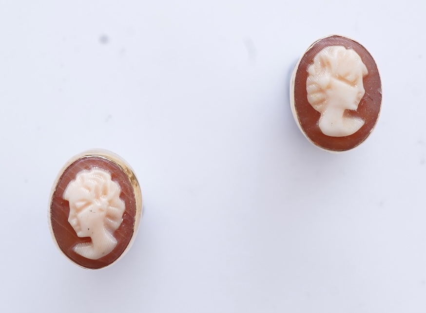 Eight pairs of earrings and pendant, comprising: a pair of onyx studs; a pair of emerald studs; a pair of sapphire and diamond drop earrings; a pair of opal drop earrings; a pair of garnet drop earrings; and a shell pend